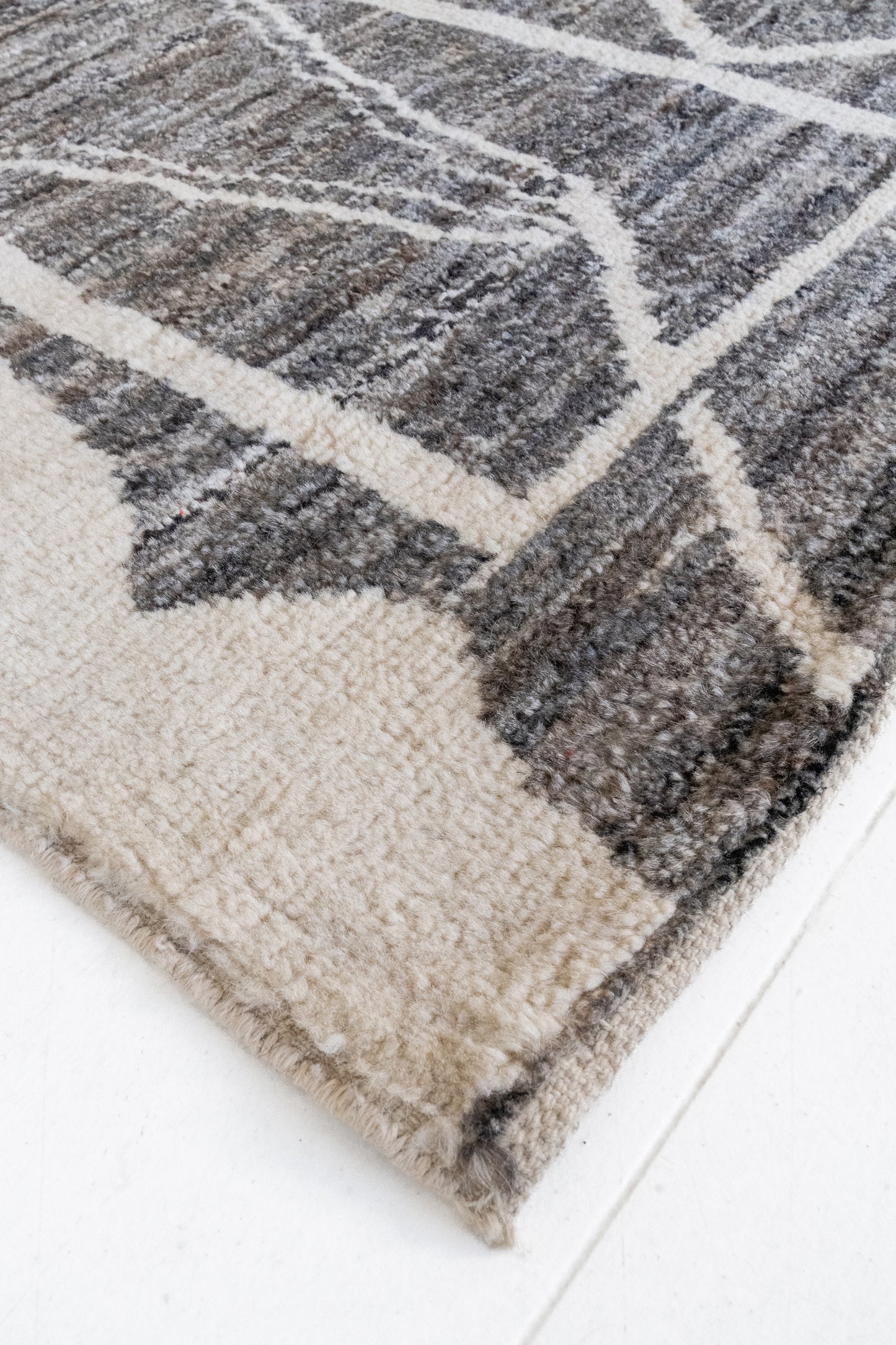 District Loom Modern hand knotted Afghan Tulu area rug made to order