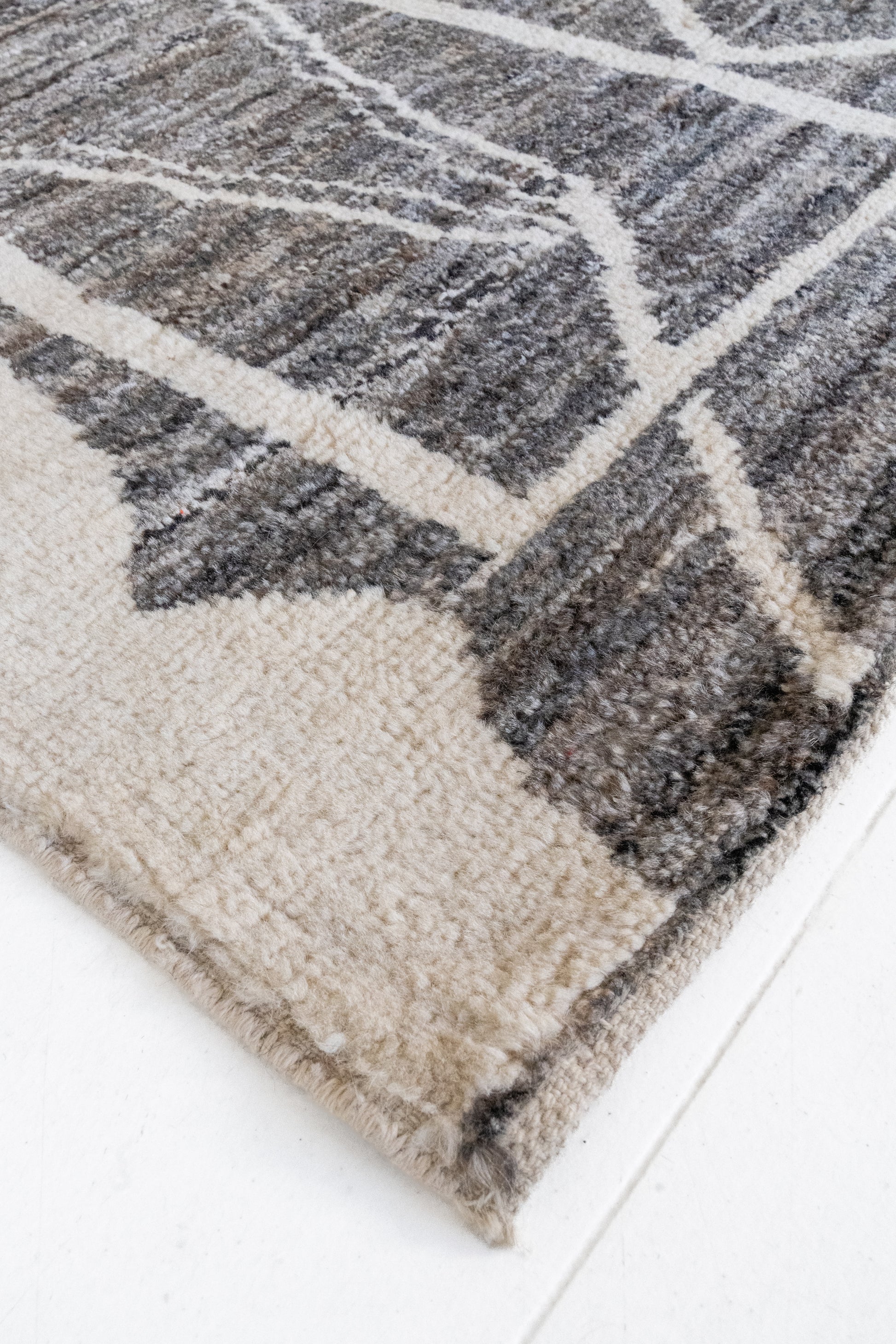 District Loom Modern hand knotted Afghan Tulu area rug made to order