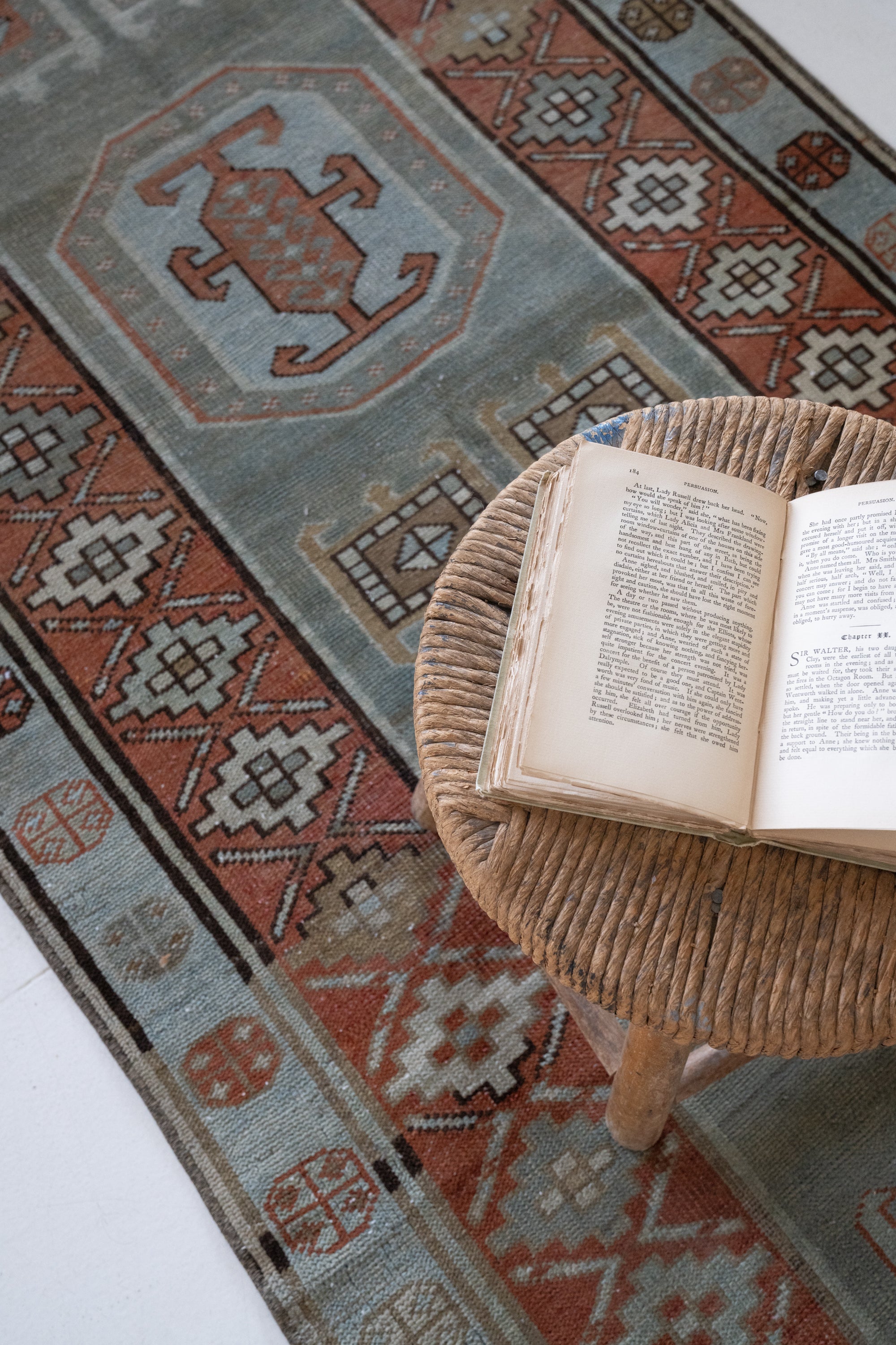 District-Loom-Vintage-Caucasian-Runner-Rug-Townsend-Styled-Stool-Book