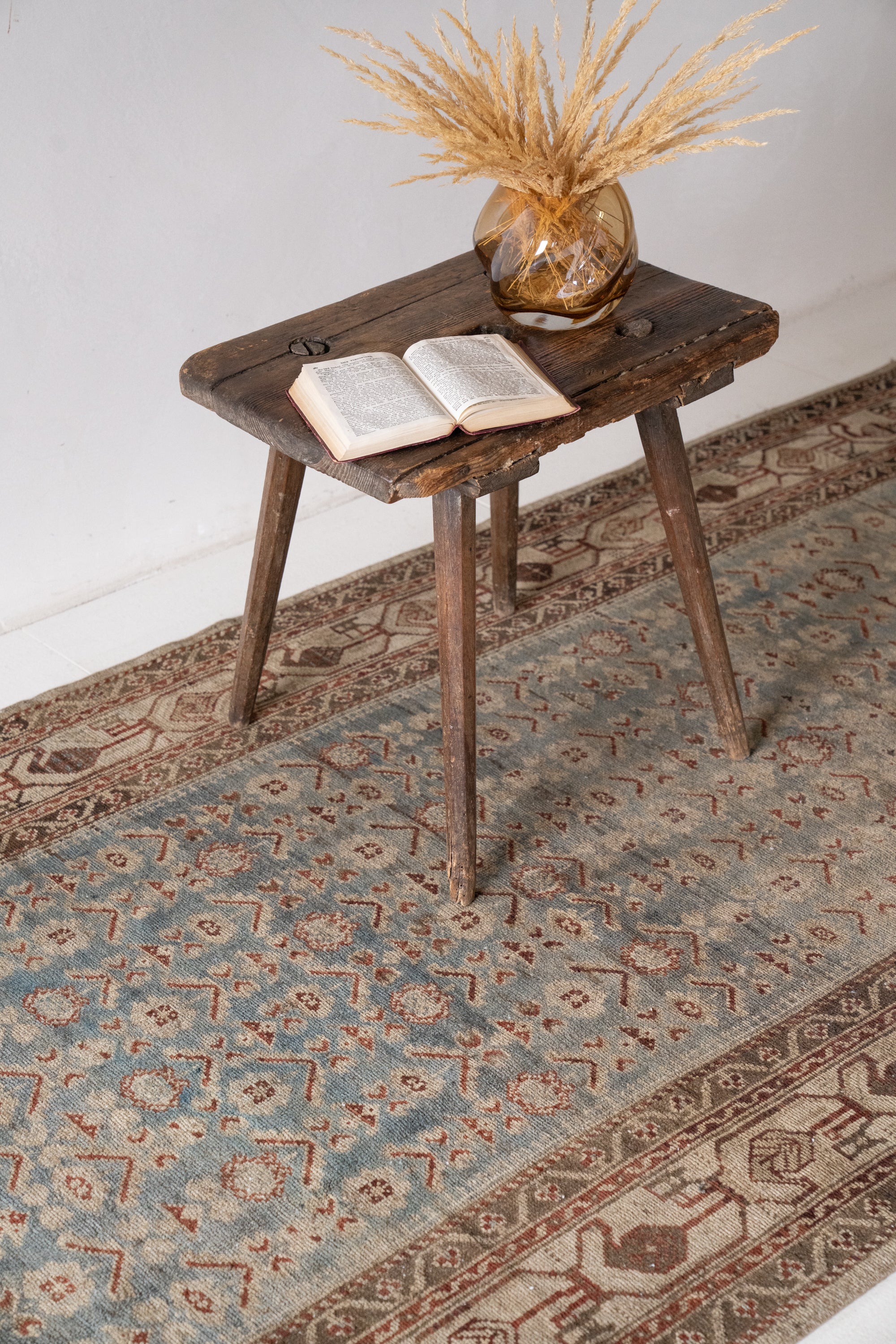 District-Loom-Vintage-Malayer-Runner-Rug-Styled-Book-On-Table