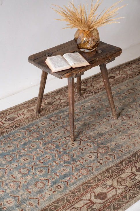 District-Loom-Vintage-Malayer-Runner-Rug-Styled-Book-On-Table