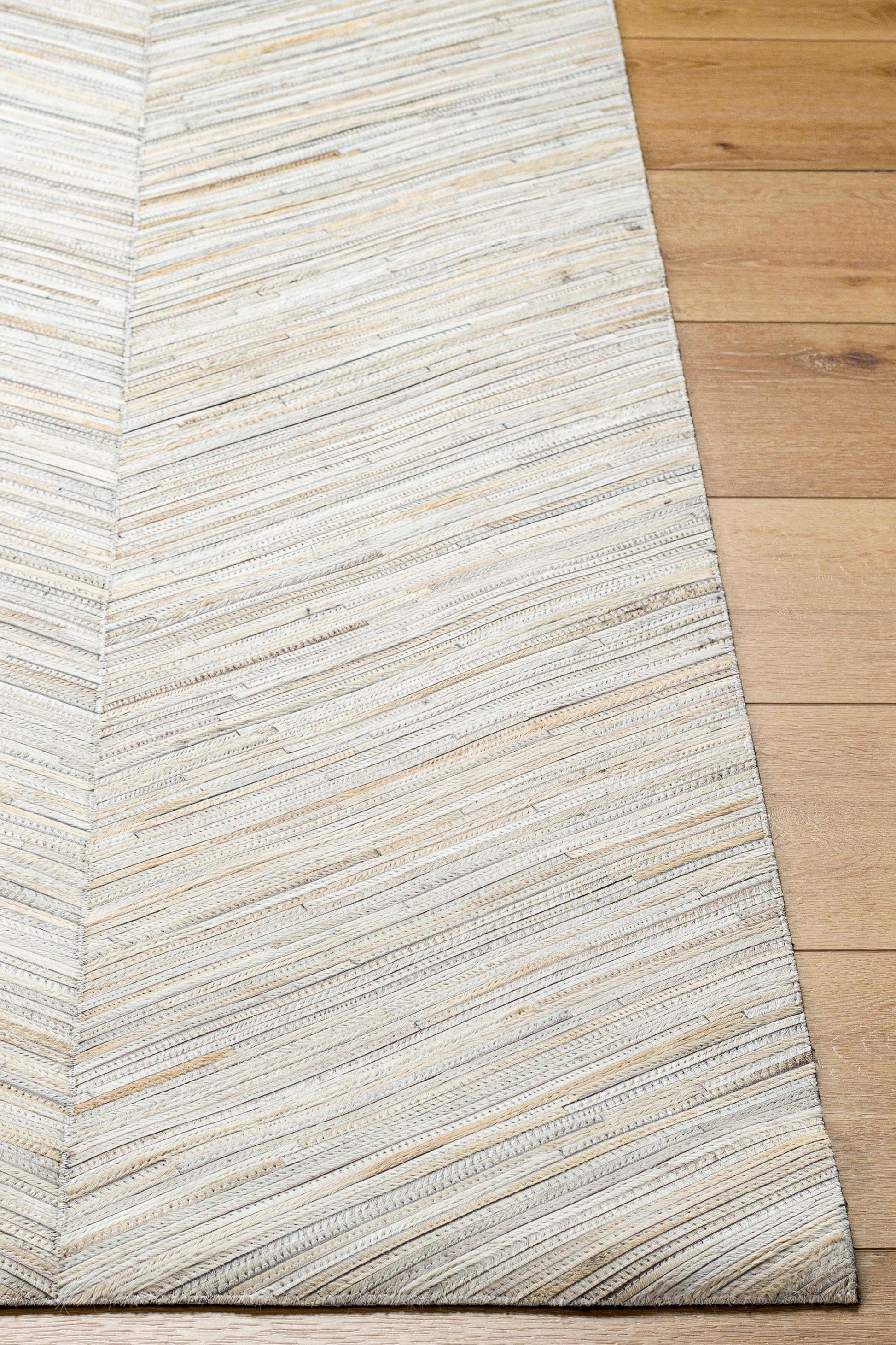 District Loom Banner Hair on Hide Rug