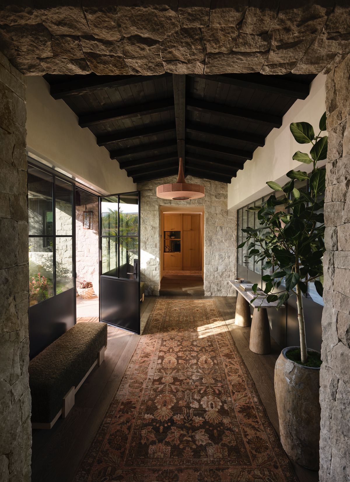 District Loom vintage rug in entry of Disc Interiors Newport Beach Project