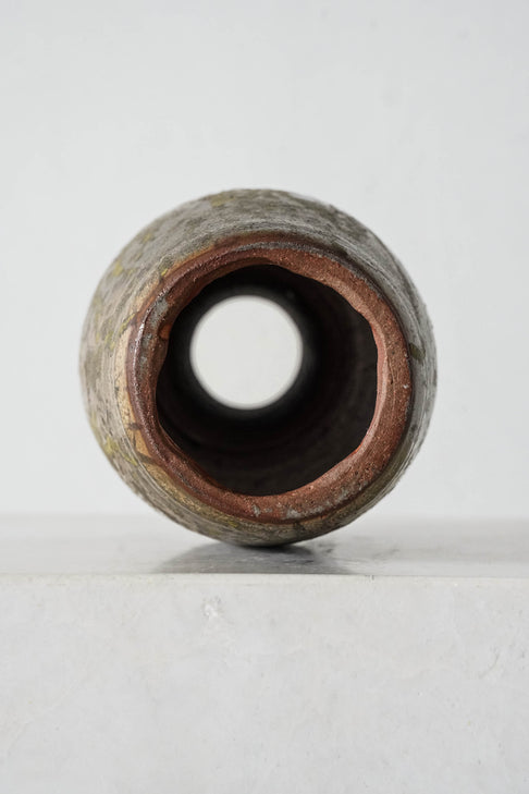 District Loom Decor Handcrafted ceramic vessel features a hollow, open space to store items of your choice