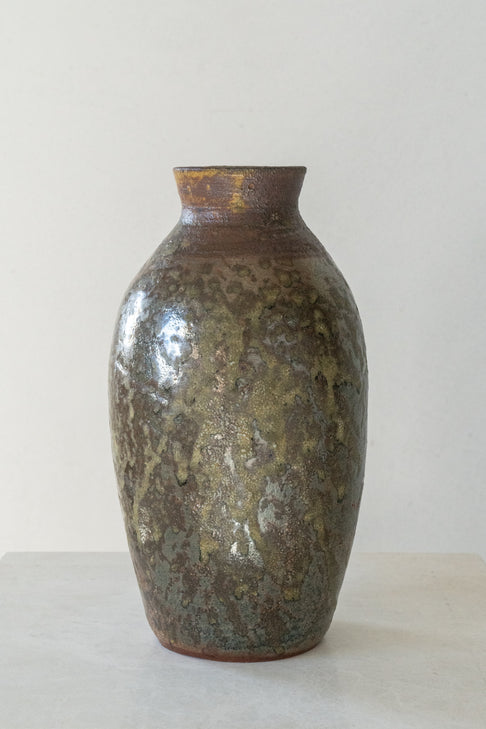 District Loom Decor Handcrafted ceramic vessel features a hollow, open space to store items of your choice