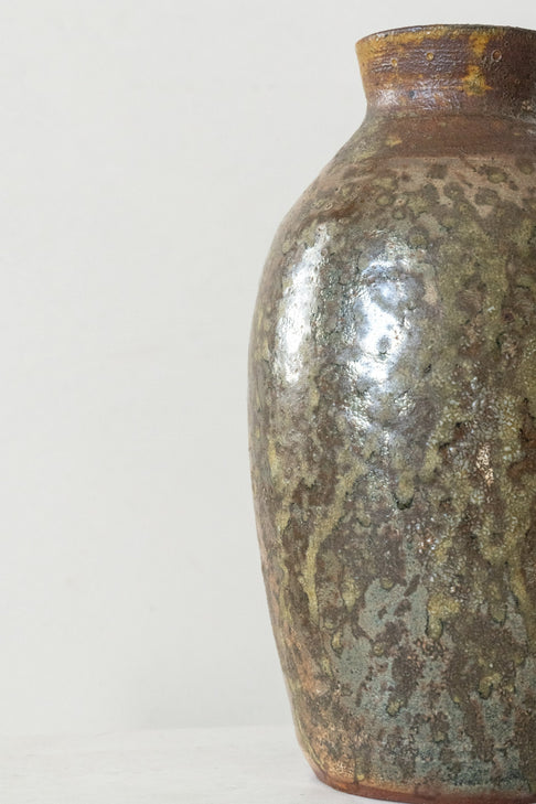District Loom Decor Handcrafted ceramic vessel features a hollow, open space to store items of your choice