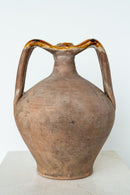 District Loom Italian terracotta amphora is an antique, hand-thrown piece with a strong body and seamlessly connected handles and spout