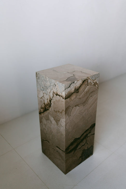 District Loom Furniture Illusion Bronze marble plinth pedestal locally sourced from natural marble stone slab remnants and handcrafted to serve as a sustainable sculptural element in your
