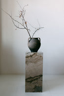 District Loom Furniture Illusion Bronze marble plinth pedestal locally sourced from natural marble stone slab remnants and handcrafted to serve as a sustainable sculptural element in your