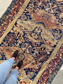 Standing on Antique Rug