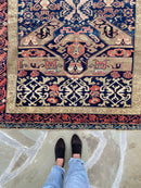 standing next to Antique Caucasian Zekhur Kuba